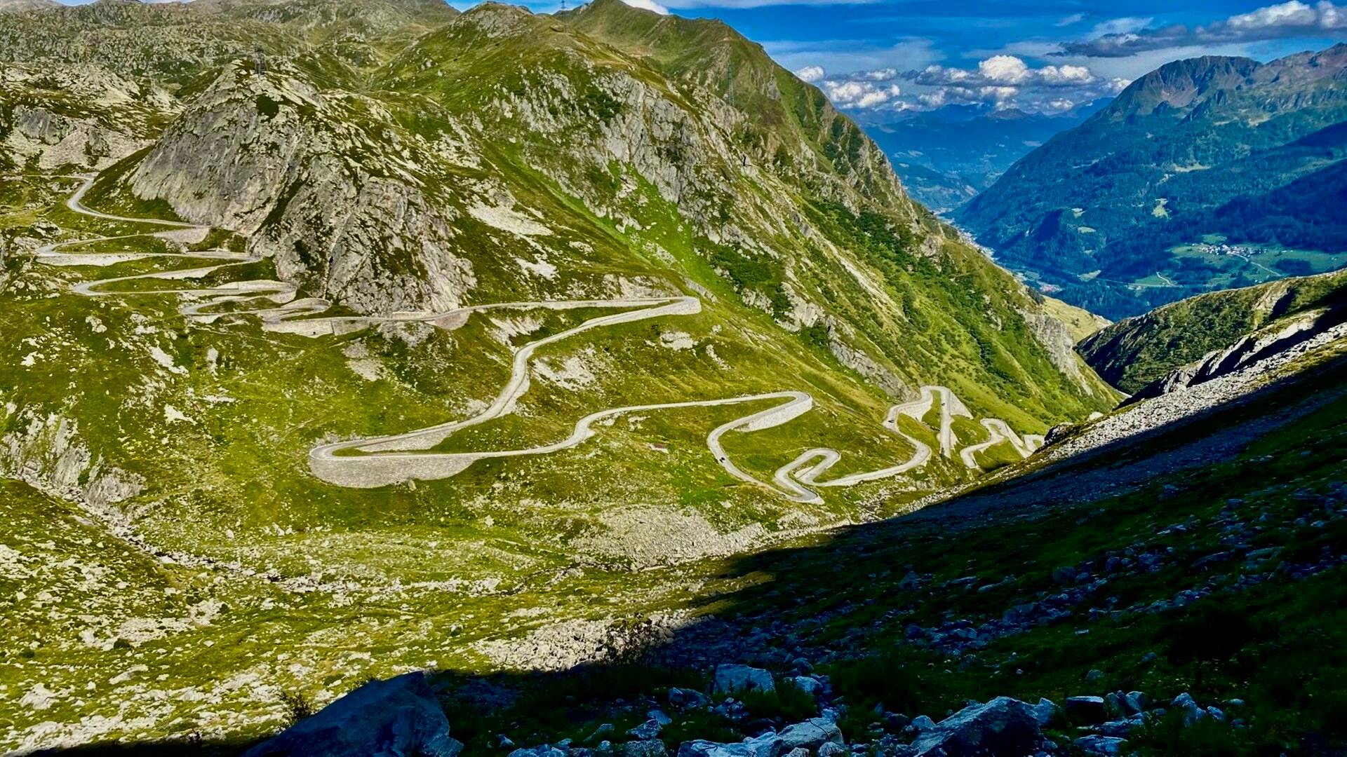 Switchback road winding up an alpine pass